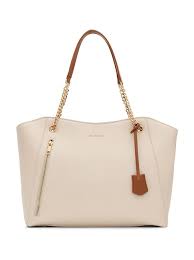a white and brown women bag